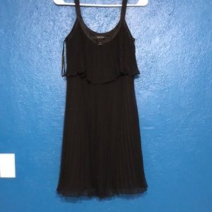 White House Black Market black cocktail pleated dress.Size 4 never worn no stain